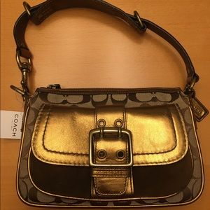 Rare find. Gold and brown Coach small Hobo purse